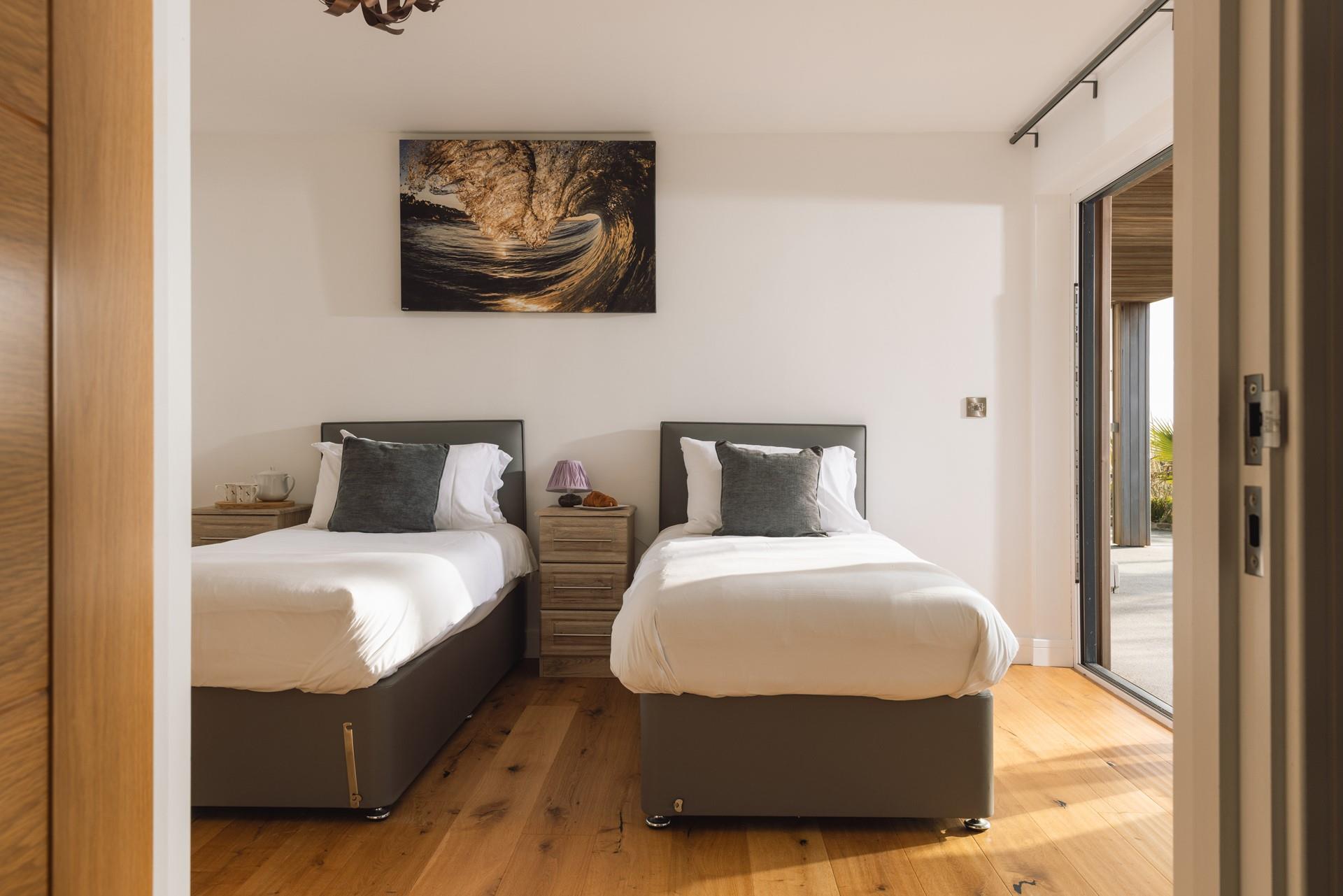 Bedroom 3 also has patio and garden access.