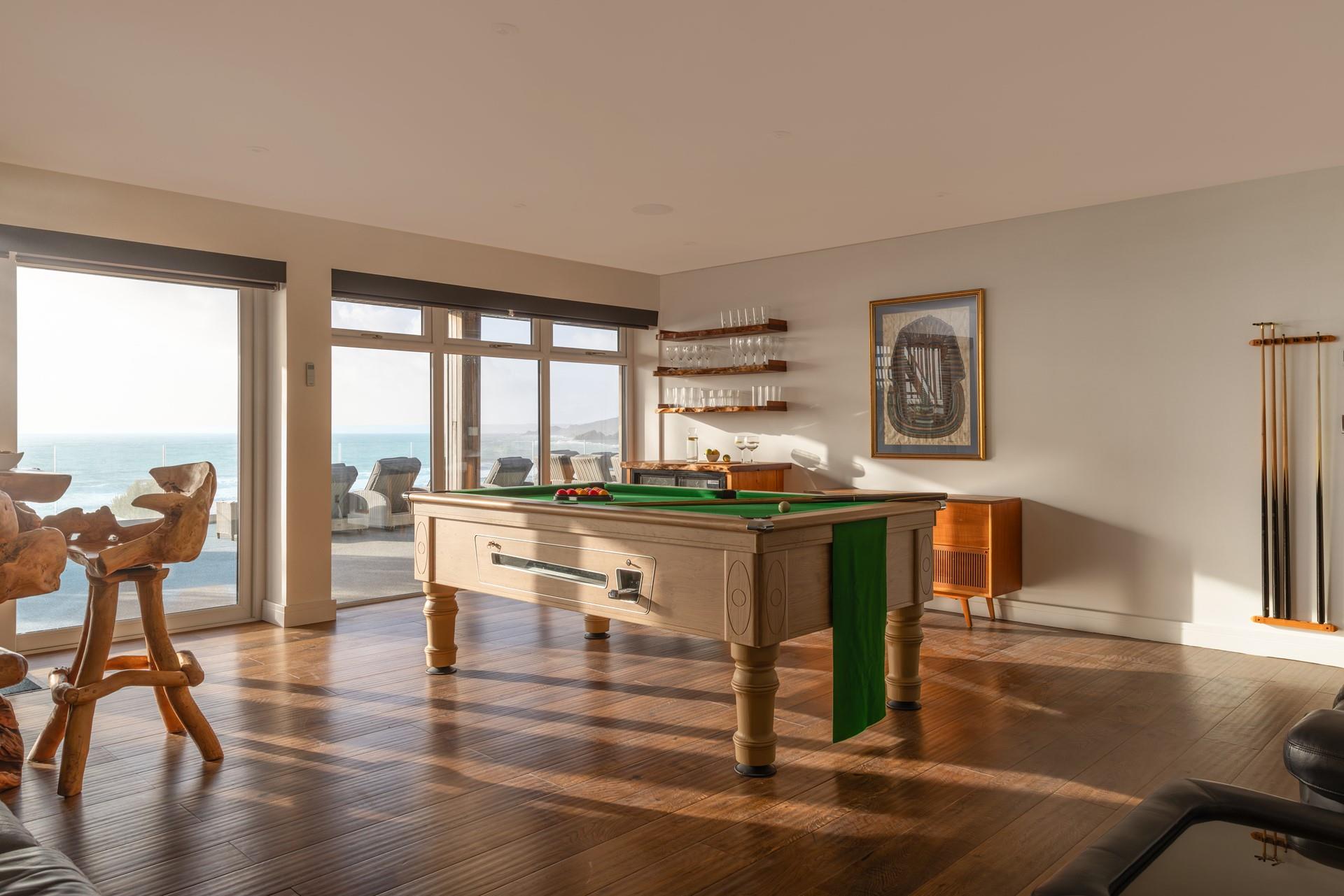 Kids will love the games room featuring a pool table!