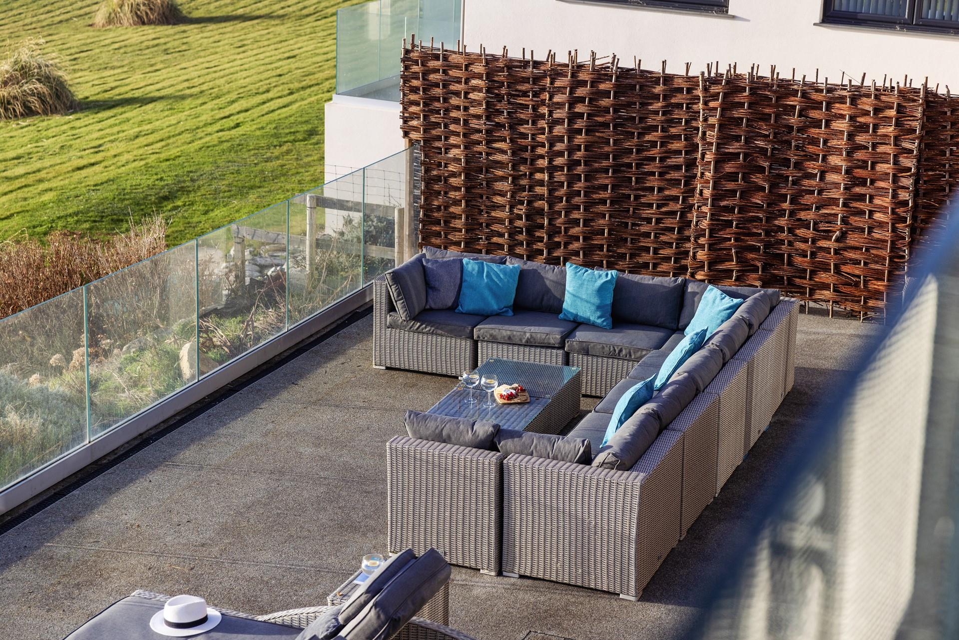 Spend summer days out on the patio after mornings on the beach.