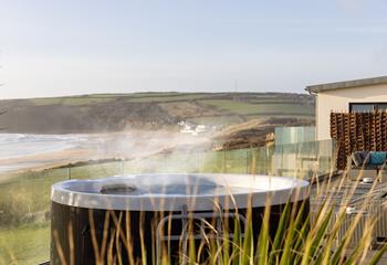 Take a relaxing dip in the steamy hot tub and enjoy watching the waves gently roll onto shore.