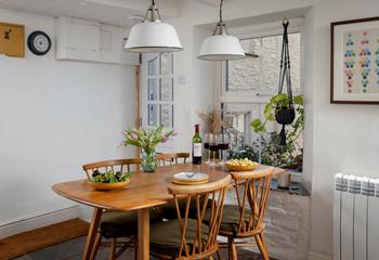 Relax around the dining table after a day of coastal adventures.