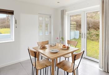 Open the patio doors to the garden and enjoy the warm summer breeze!