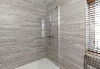 Wash the day away in the modern shower room.
