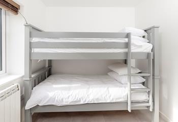 Tuck the kids into the bunk beds after a memorable beach day.
