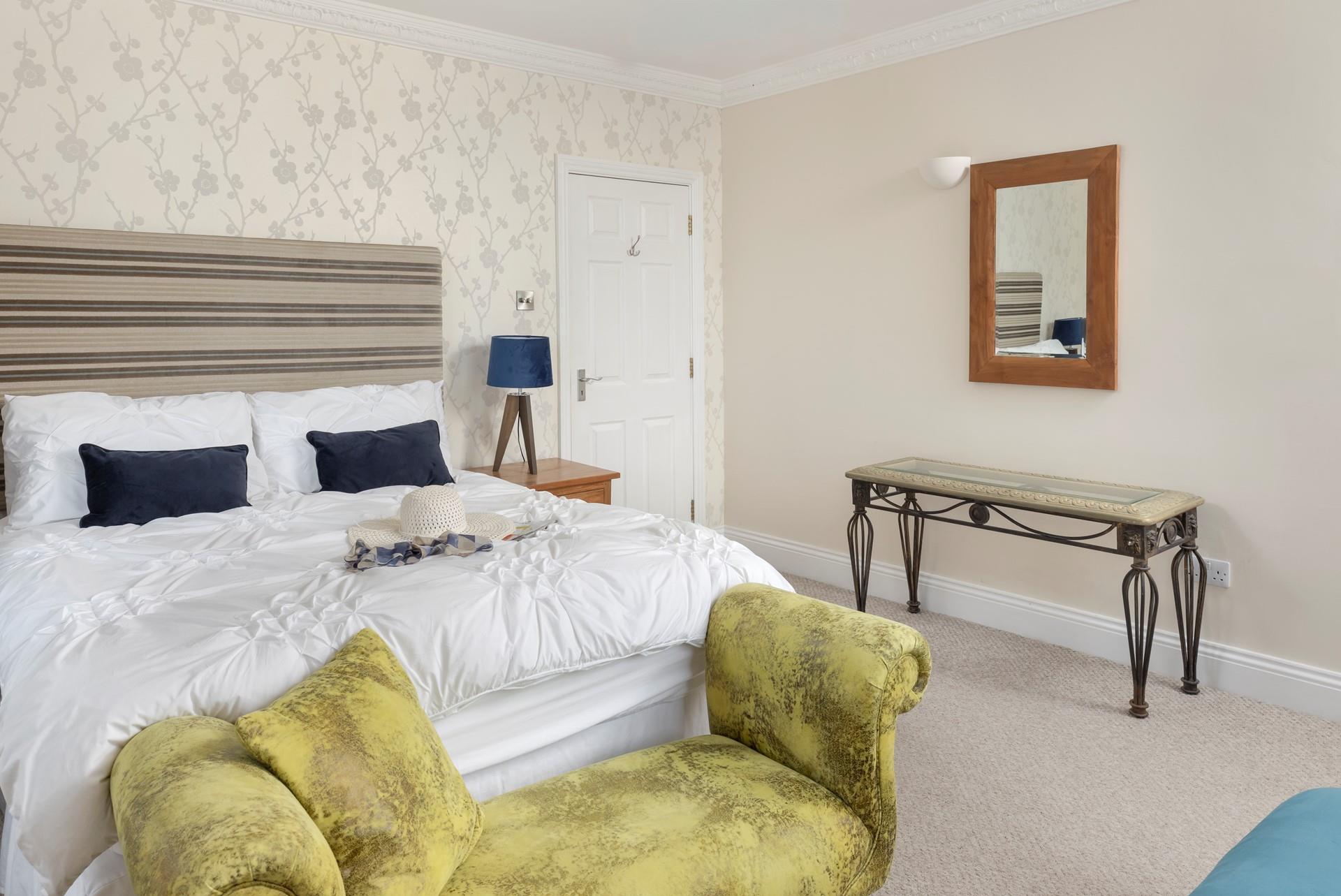 Sink into the spacious bed and drift into a dreamy night's sleep.