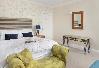 Sink into the spacious bed and drift into a dreamy night's sleep.