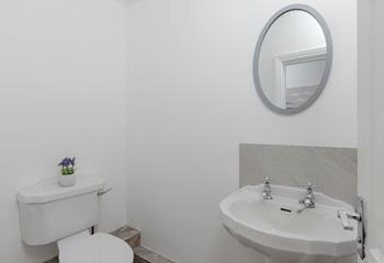 The family bathroom is a modern space to get ready each day.