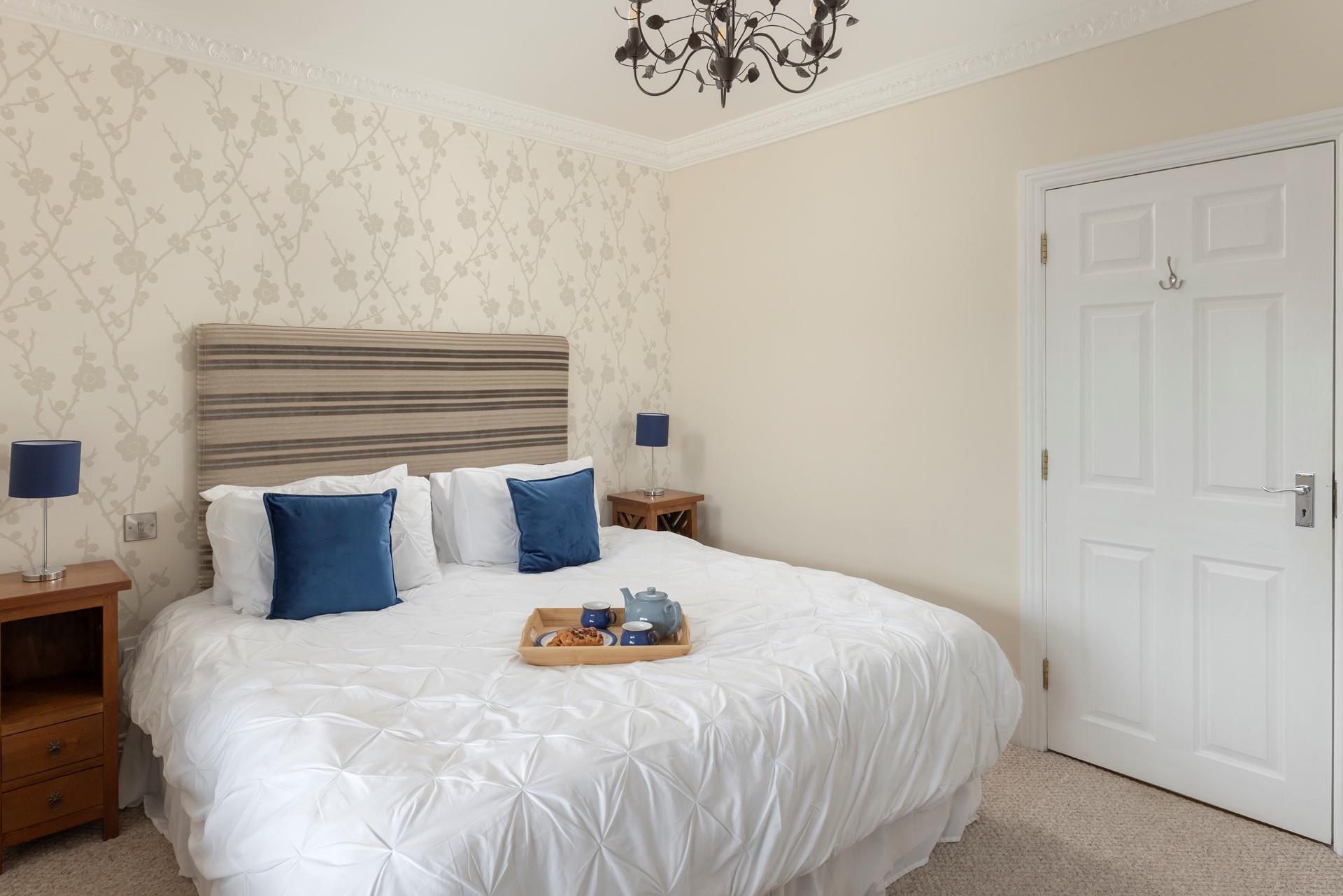 Relax in the king size bed after a memorable day of exploring!