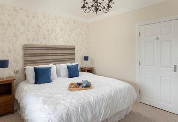 Relax in the king size bed after a memorable day of exploring!