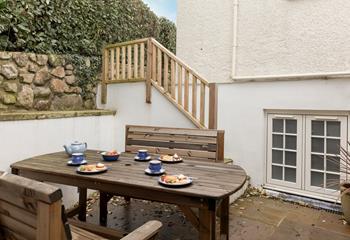 The patio is the perfect spot to soak up the sunshine in the warm summer months.