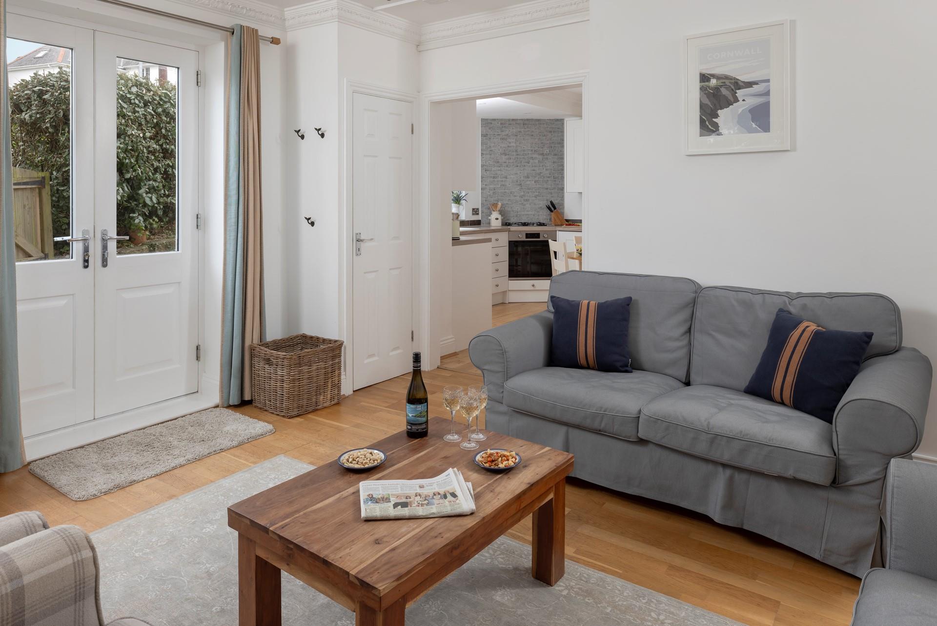 Decorated with modern neutral tones, the apartment is tastefully decorated.