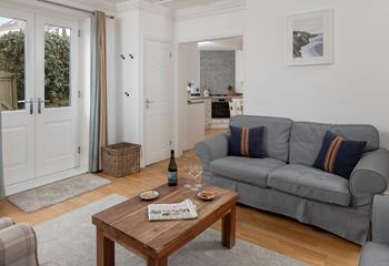 Decorated with modern neutral tones, the apartment is tastefully decorated.