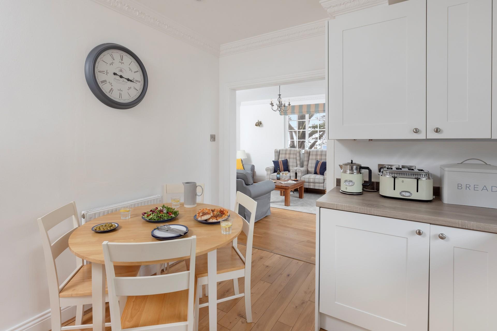 The modern kitchen diner is a delight to cook meals!