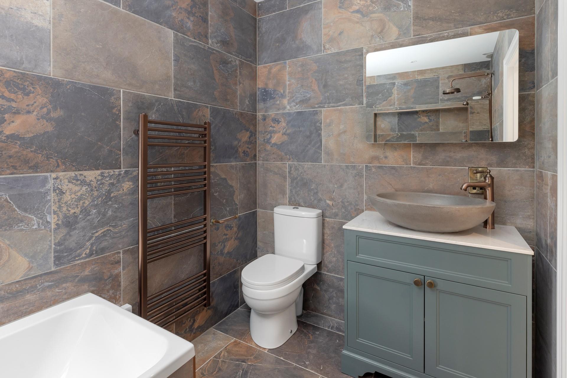 Get ready for the day in the family bathroom.