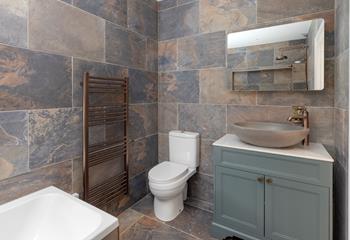 Get ready for the day in the family bathroom.