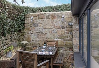 Sip a cold glass of wine in the summer sunshine.