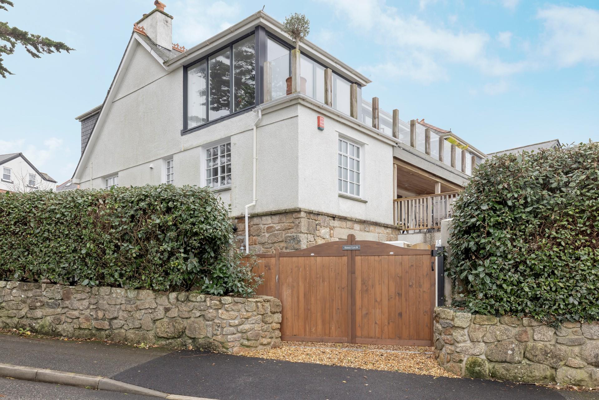 Take a five minute stroll to the sandy Carbis Bay Beach!