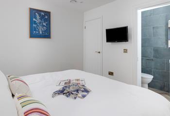 Bedroom 2 has an en suite for getting ready each morning.