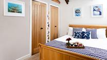 Bedroom 1 is thoughtfully designed for restful nights and relaxed mornings. 
