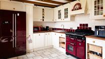 Rustic character and modern convenience come together in the kitchen. 
