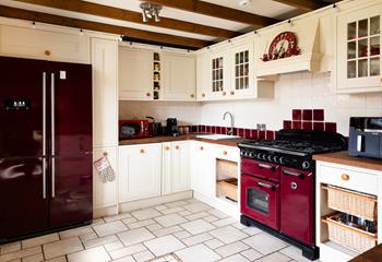 Rustic character and modern convenience come together in the kitchen. 