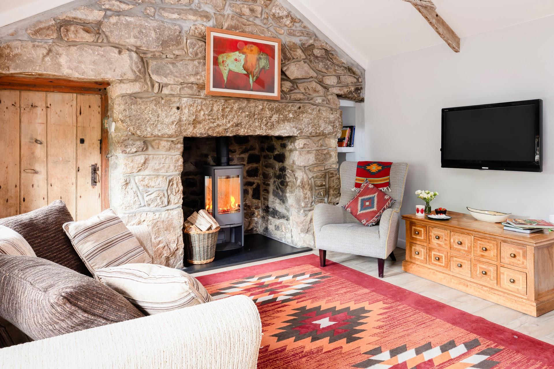 The sitting room is a cosy spot for movie nights, board games and lazy afternoons. 