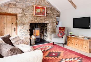 The sitting room is a cosy spot for movie nights, board games and lazy afternoons. 