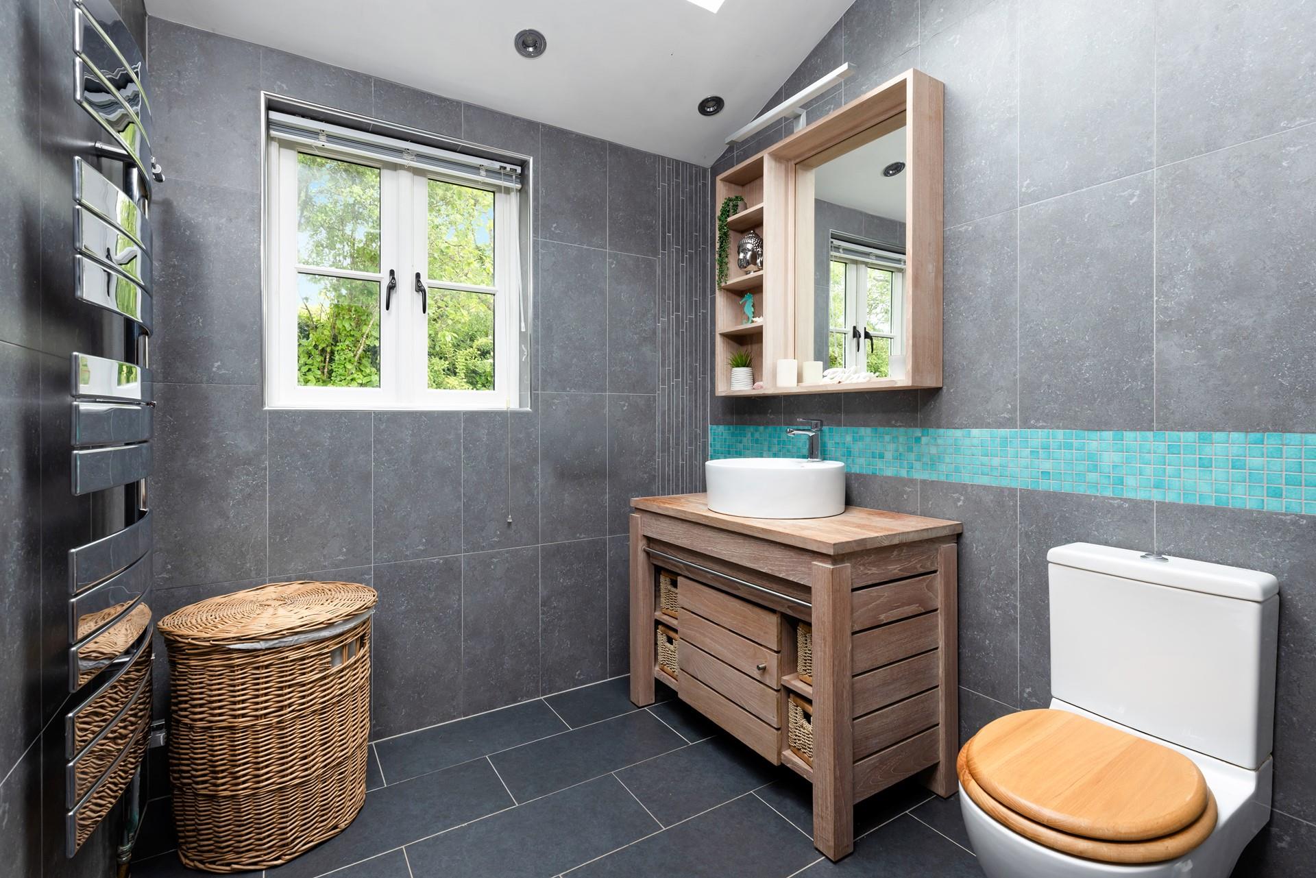 The downstairs cloakroom and steam room is perfect to unwind in. 
