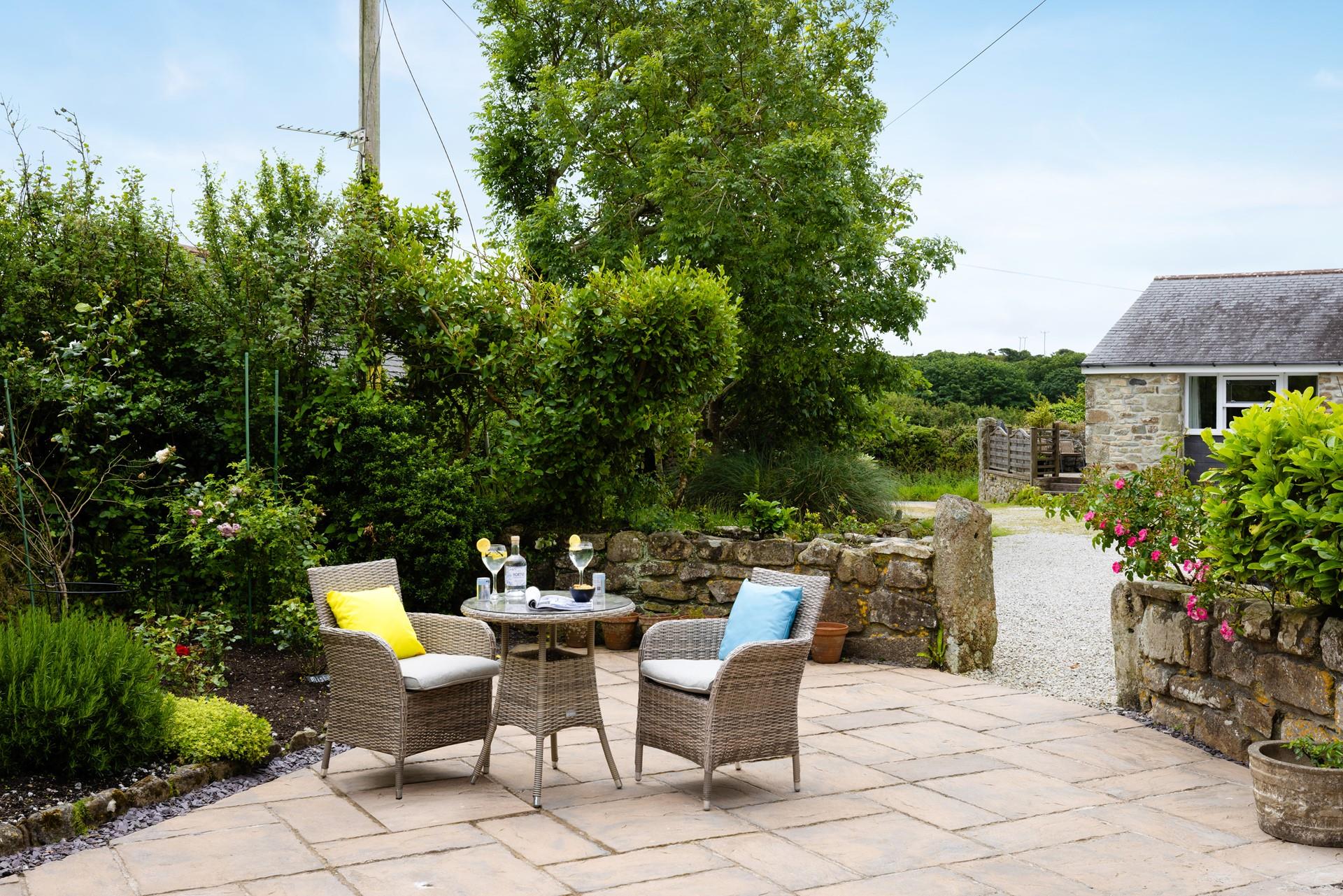 Relax in the sunshine and enjoy the peace and quiet with a refreshing drink.