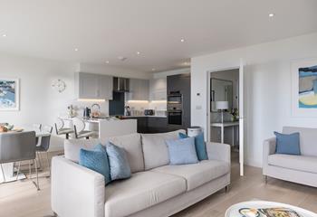 The open plan living space is light and bright with plenty of space for relaxation.