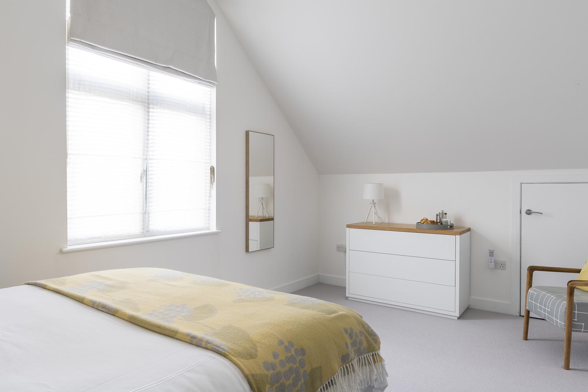 Bedroom 2 is light and spacious. 