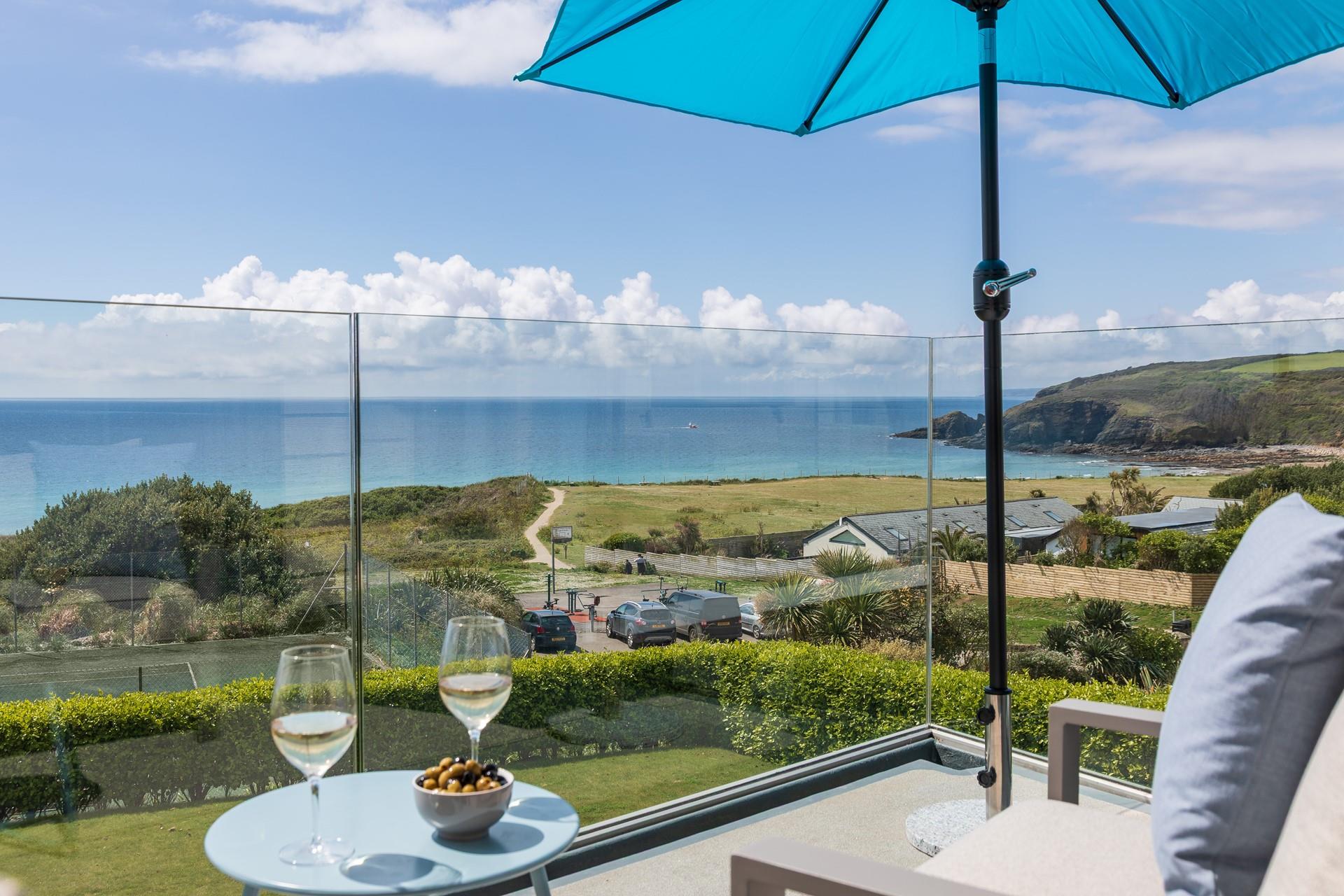 Treat yourself to a glass of something chilled with the ocean as your backdrop.