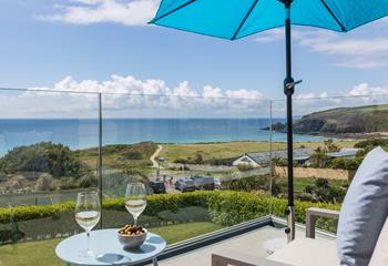 Treat yourself to a glass of something chilled with the ocean as your backdrop.