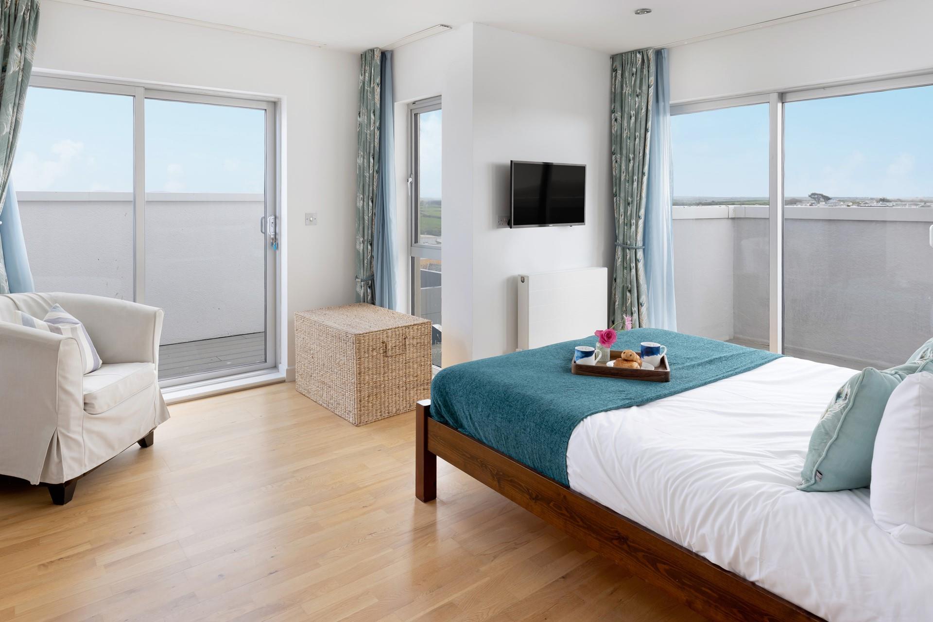 The luxurious bedroom offers a sanctuary of relaxation.