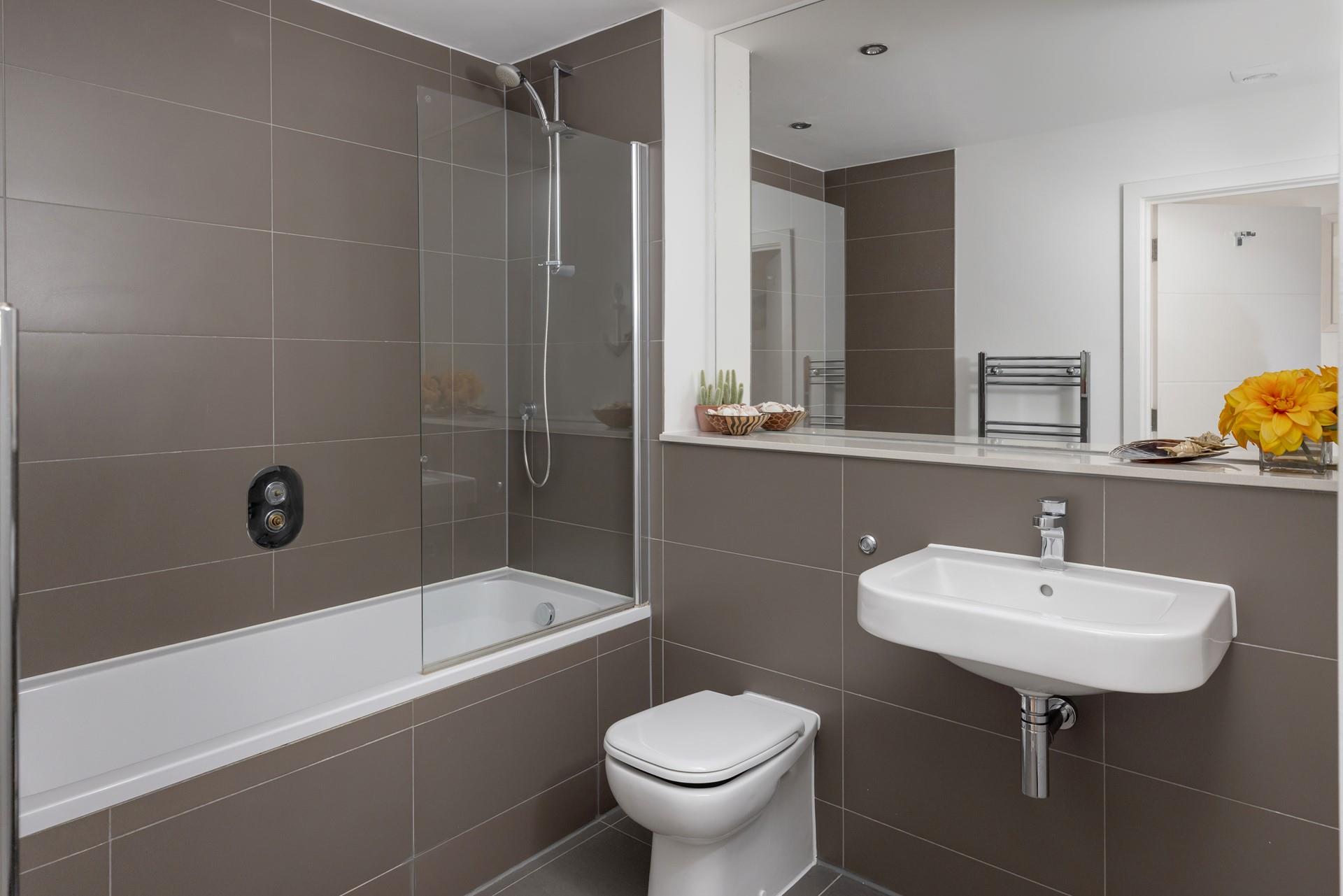 Enjoy a morning soak in the luxurious tub before starting your day.