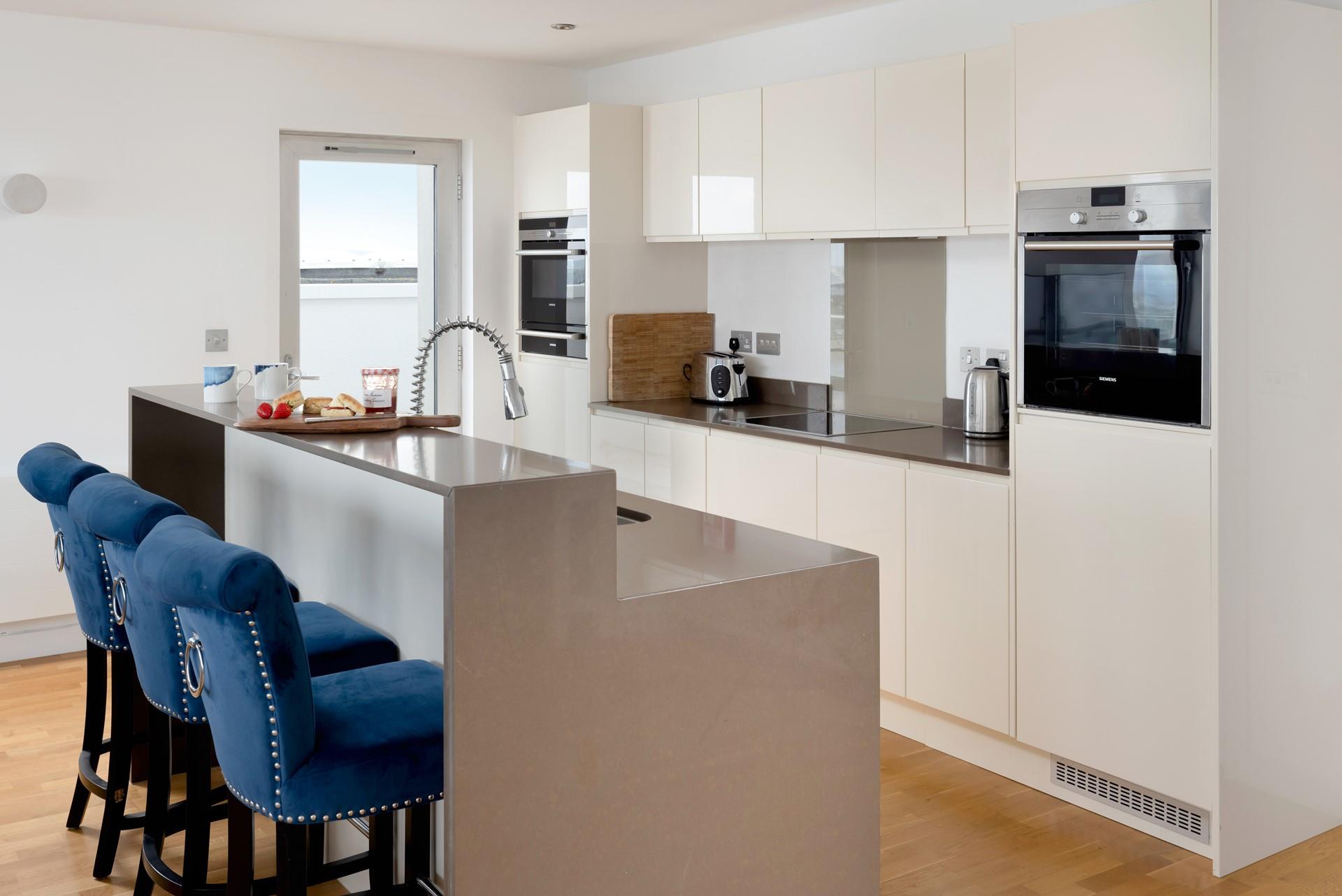 The kitchen is well equipped for preparing a meal for the whole family. 