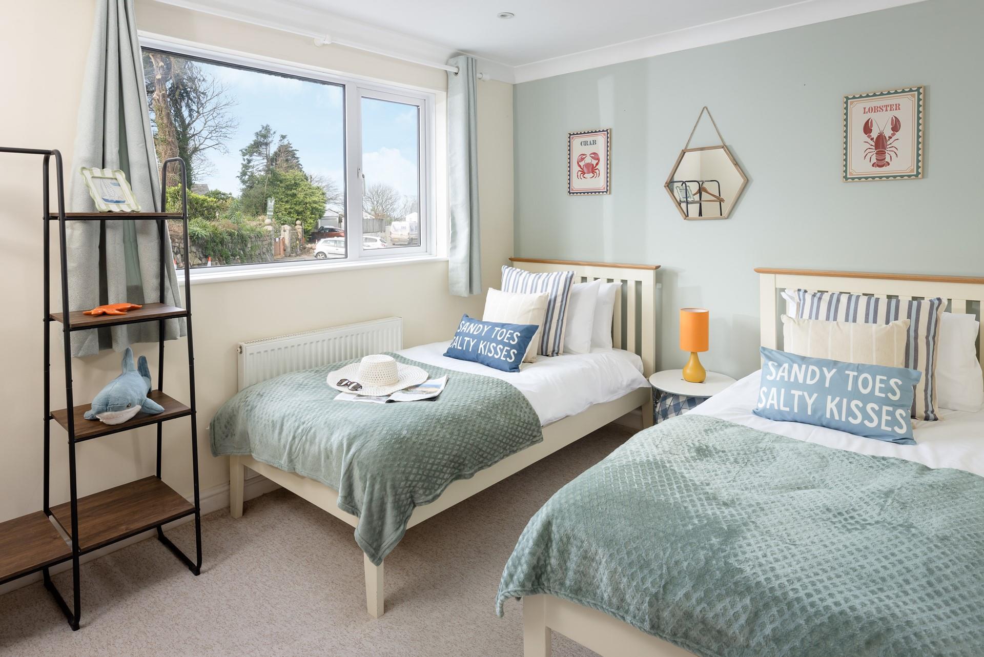 The twin beds are the perfect place for kids to unwind after a day of exploring. 