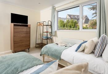 Watch tv from the comfort of bed. 