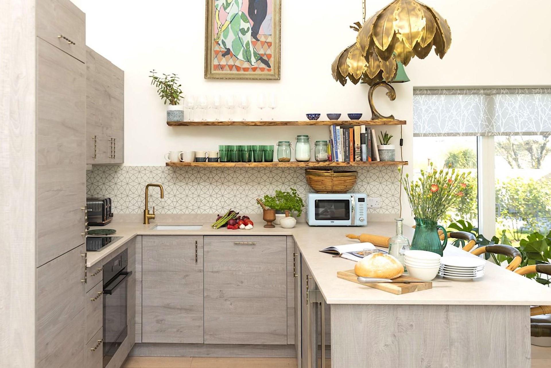 The contemporary kitchen is well-equipped and a joy to cook in!