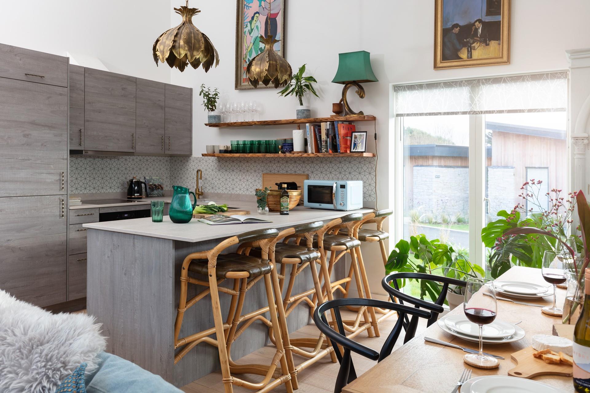 The contemporary kitchen is well-equipped and a joy to cook in!