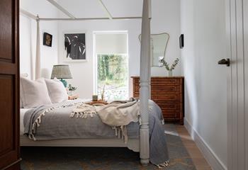 Bedroom 1 has direct access and a view of the pretty garden.