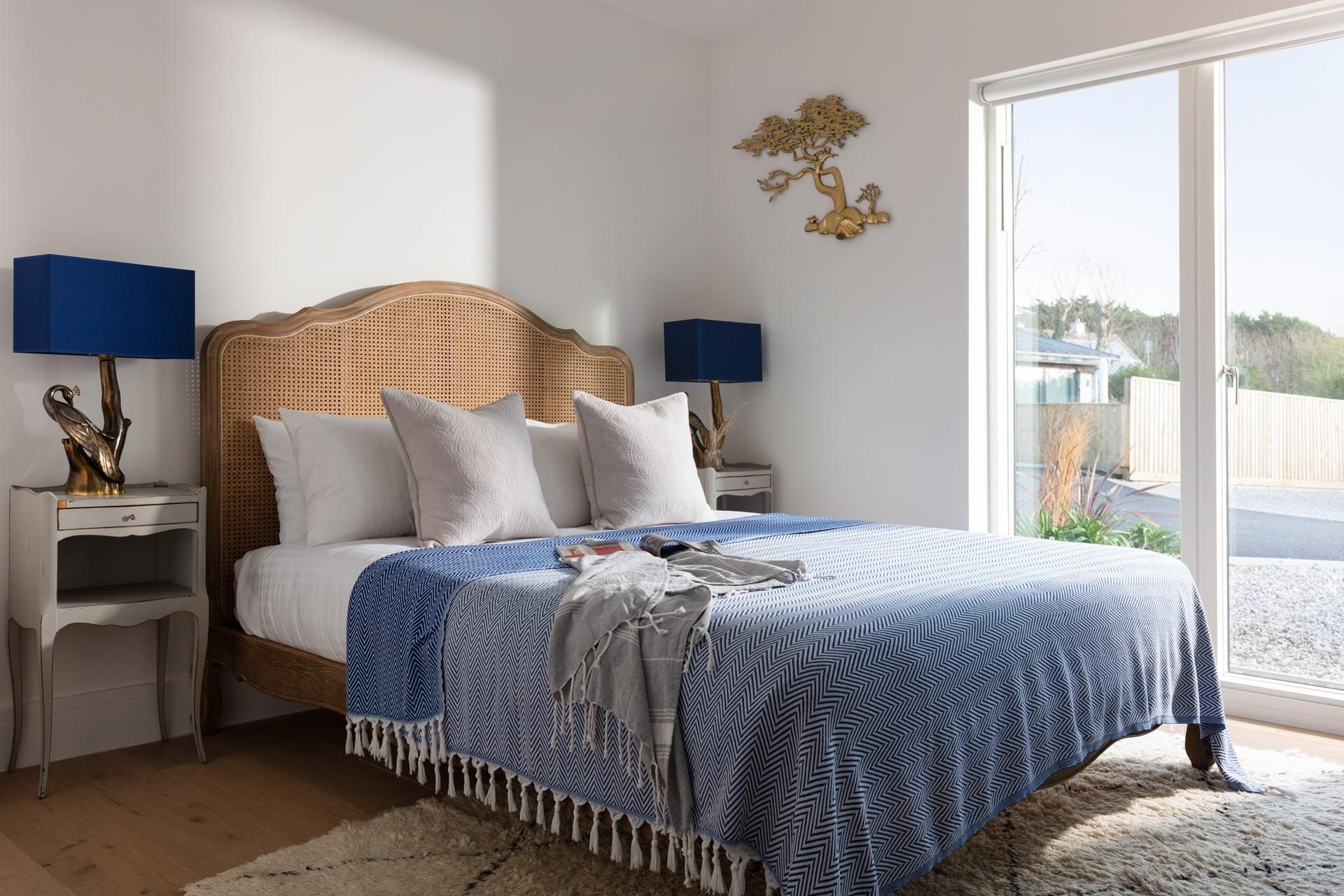 Coastal blues reflect the seaside location.