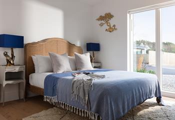 Coastal blues reflect the seaside location.