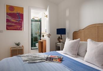 Bedroom 3 boasts a stylish en suite shower room.