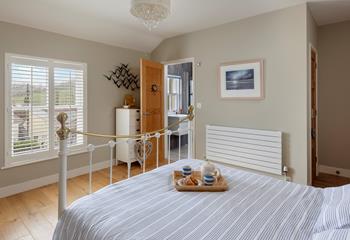 Bedroom 1 is spacious and has an en suite.