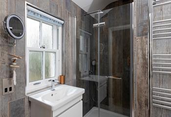 The en suite shower room is ideal for washing the day away each evening.