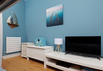 Little ones can relax in the bunk room after days of fun on a nearby beach.