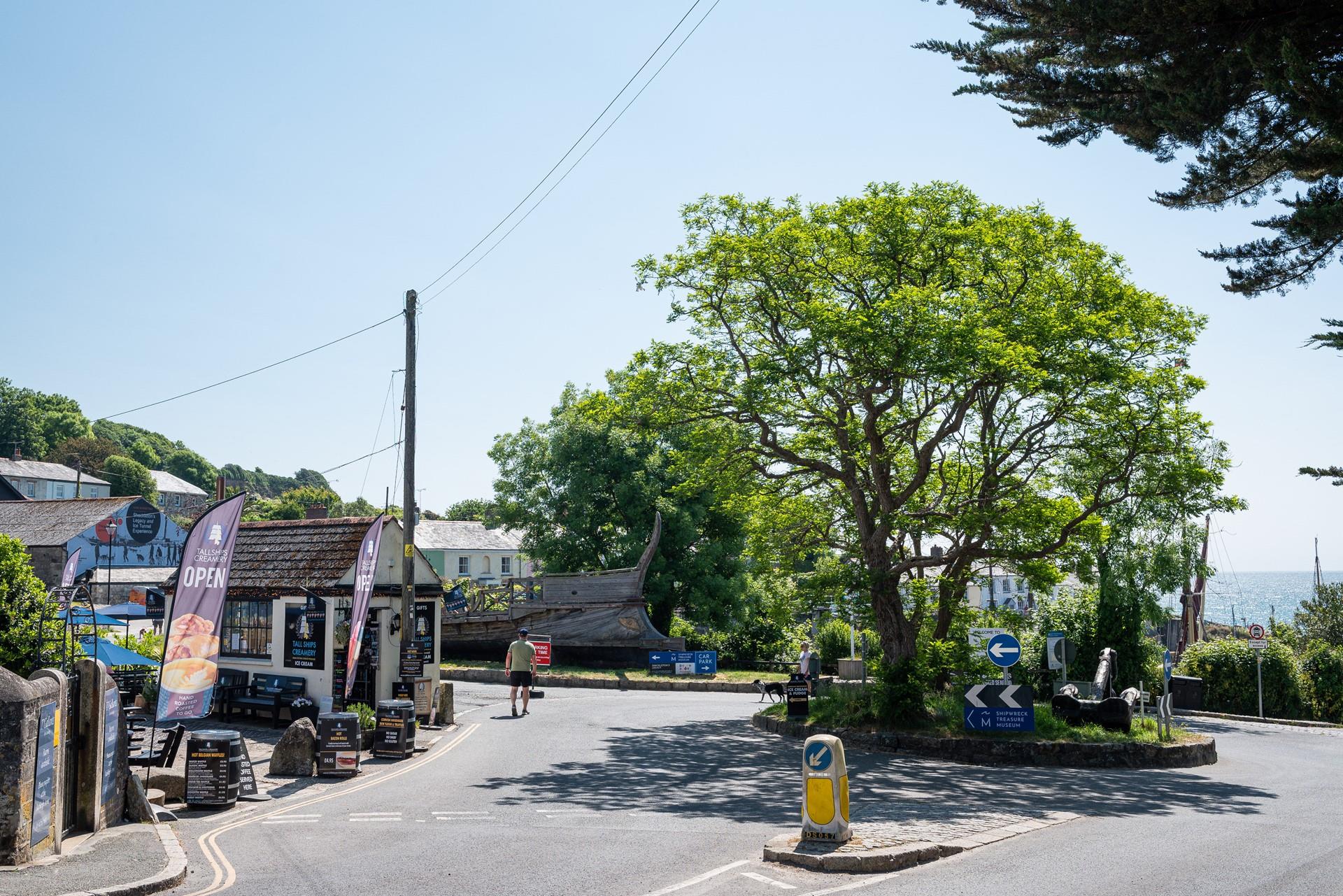 Wander the sunny streets of this Cornish village.