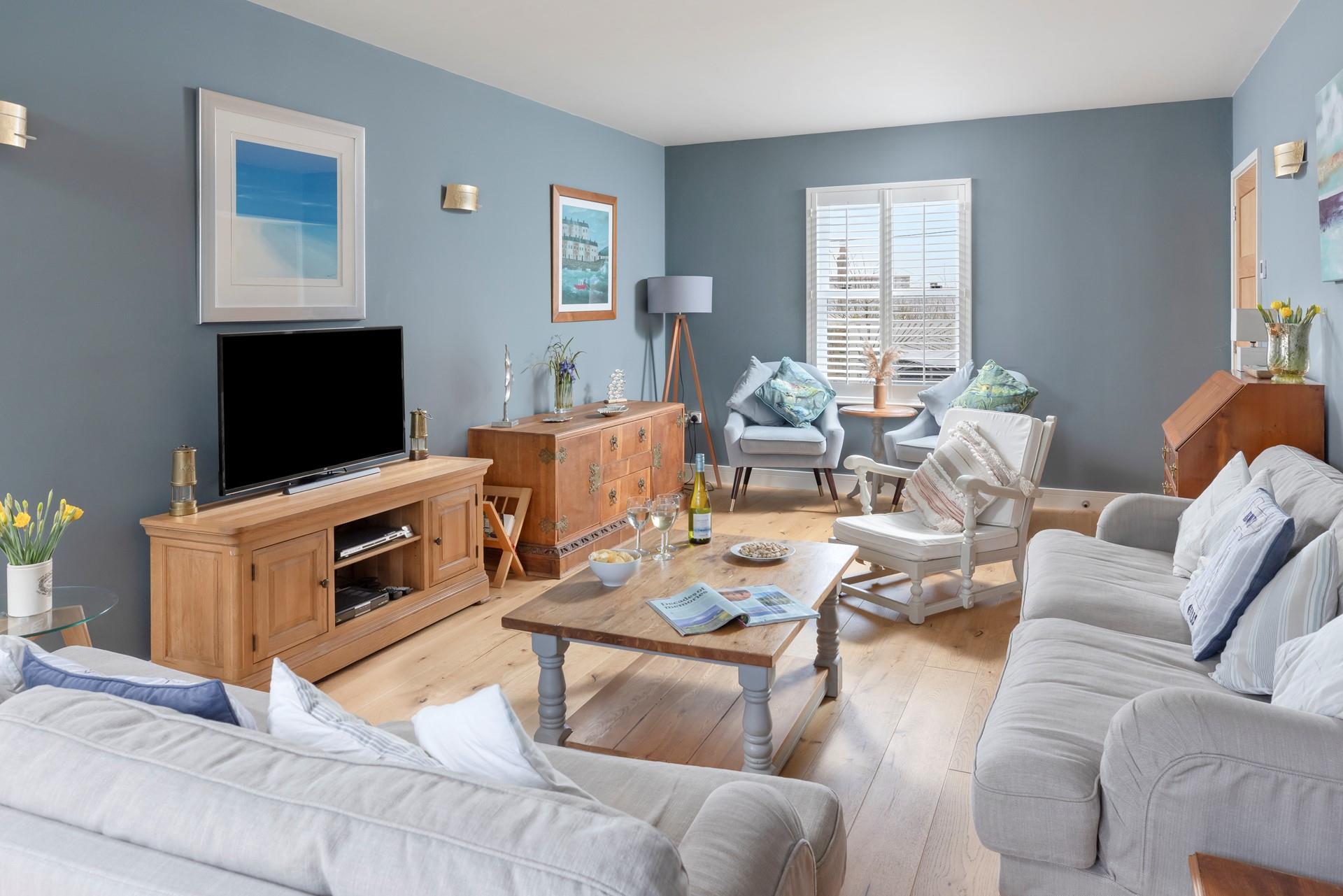 The cosy sitting room offers relaxation at the end of the day.