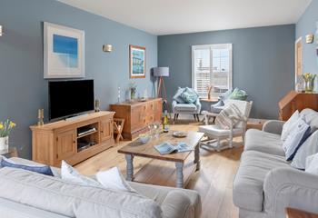 The cosy sitting room offers relaxation at the end of the day.